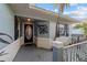 Covered front porch with brick accents and decorative details at 9001 Sw 91St Cir, Ocala, FL 34481