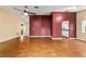 Spacious living room featuring hardwood floors and an open layout at 9001 Sw 91St Cir, Ocala, FL 34481