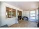 Enclosed sunroom with tile flooring and multiple screened windows at 9021 Sw 108Th Pl, Ocala, FL 34481