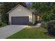 Charming single-story home featuring a well-manicured lawn and an inviting entrance at 9170 Sw 65Th Loop, Ocala, FL 34481