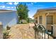 Well-maintained backyard with stone pathways and manicured landscaping, providing a serene outdoor space at 9266 Sw 91St Cir, Ocala, FL 34481