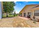 Spacious backyard with stone pathway and open patio, perfect for outdoor activities and entertaining at 9266 Sw 91St Cir, Ocala, FL 34481