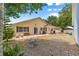 Charming single-story home with a cozy backyard and patio, ideal for outdoor relaxation and entertaining at 9266 Sw 91St Cir, Ocala, FL 34481