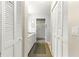 Bright bathroom featuring dual closets, a spacious vanity, and a walk-in shower with glass doors at 9266 Sw 91St Cir, Ocala, FL 34481