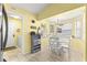Charming breakfast nook with ample natural light and a view of the laundry area at 9266 Sw 91St Cir, Ocala, FL 34481