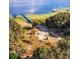 Expansive aerial view of land near the lake featuring trees, grass, and open spaces at 9330 Se 106Th Pl, Belleview, FL 34420
