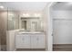Bright bathroom with double vanity, granite countertop, and walk-in shower at 1143 Sw Tamiami Pl, Dunnellon, FL 34431