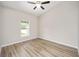 Bedroom featuring durable floors, neutral paint and natural light at 1143 Sw Tamiami Pl, Dunnellon, FL 34431