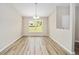 Dining room featuring durable floors, neutral paint and lots of natural light at 1143 Sw Tamiami Pl, Dunnellon, FL 34431