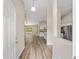 Inviting entryway with views of the open-concept living area and kitchen at 1143 Sw Tamiami Pl, Dunnellon, FL 34431