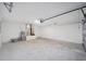 Spacious two car garage perfect for storage or workshop with door to the house at 1143 Sw Tamiami Pl, Dunnellon, FL 34431