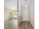 Living room featuring durable floors, neutral paint and lots of natural light at 1143 Sw Tamiami Pl, Dunnellon, FL 34431