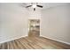 Spacious living room featuring durable floors, neutral paint and an open kitchen at 1143 Sw Tamiami Pl, Dunnellon, FL 34431