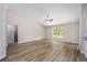 Open-concept living area featuring durable floors, neutral paint and lots of natural light at 1143 Sw Tamiami Pl, Dunnellon, FL 34431
