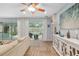 Inviting living room with pool views, creating a serene atmosphere for relaxation and entertainment at 12804 Se 90Th Court Rd, Summerfield, FL 34491