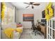 Cozy home office with a comfortable seating area and a functional desk space at 12804 Se 90Th Court Rd, Summerfield, FL 34491