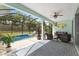 Expansive screened patio overlooking the pool, providing a relaxing outdoor living space at 12804 Se 90Th Court Rd, Summerfield, FL 34491