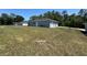 The backyard of the house with a gray exterior at 14437 Sw 21St Pl, Ocala, FL 34481