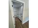 Half bathroom featuring white cabinets, granite countertops and modern hardware at 14437 Sw 21St Pl, Ocala, FL 34481
