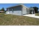 Charming single-story home featuring a well-maintained lawn and an attached one car garage at 14437 Sw 21St Pl, Ocala, FL 34481