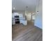Open-concept living area with kitchen, dining, and Gathering room, perfect for entertaining at 14437 Sw 21St Pl, Ocala, FL 34481