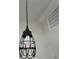 Close up of a pendant style light fixture hanging from the ceiling at 14443 Sw 21St Pl, Ocala, FL 34481