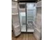 Interior view of stainless steel refrigerator with ice maker and adjustable shelves at 14443 Sw 21St Pl, Ocala, FL 34481