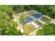Aerial view of two homes side by side, each with spacious yards and privacy fences at 15350 Sw 30Th Street, Ocala, FL 34481