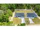 A bird's eye view of two homes showcasing their individual lots and privacy fences at 15350 Sw 30Th Street, Ocala, FL 34481