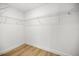 Walk-in closet with built-in shelving, providing ample storage space and organization at 15350 Sw 30Th Street, Ocala, FL 34481