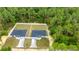 Aerial view of homes with fenced yards and ample green space at 15368 Sw 30Th St, Ocala, FL 34481
