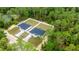 Aerial view of two homes featuring ample backyard and landscaping at 15368 Sw 30Th St, Ocala, FL 34481