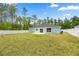 Expansive backyard featuring a patio and white vinyl fencing at 15368 Sw 30Th St, Ocala, FL 34481