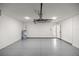 Spacious garage with epoxy floors and ample room for storage at 15368 Sw 30Th St, Ocala, FL 34481
