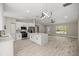 Modern kitchen with stone countertops, stainless steel appliances and wood-look floors at 15368 Sw 30Th St, Ocala, FL 34481