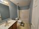 Bathroom with vanity, toilet and tub/shower showcasing functionality and ample space at 18 Fir Trail Dr, Ocala, FL 34472