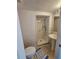 Bright bathroom featuring a stand-up shower, sink, toilet, and a fresh design at 18 Fir Trail Dr, Ocala, FL 34472