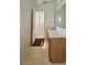 A bathroom featuring a vanity with a mirror and a view into the shower at 18 Fir Trail Dr, Ocala, FL 34472