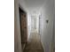 A hallway with multiple doors and architectural details at 18 Fir Trail Dr, Ocala, FL 34472