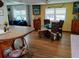 Inviting dining area adjacent to the living room with seating for four, creating an intimate space for meals and gatherings at 22736 Sw 117Th St, Dunnellon, FL 34431