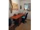Home office featuring a large desk, comfortable chair, and bright natural light at 22736 Sw 117Th St, Dunnellon, FL 34431