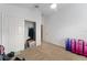 Bedroom features neutral carpeting, a closet, and an ensuite bathroom at 2296 Sheehan St, The Villages, FL 32163