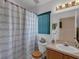 Bathroom with shower/tub combination, vanity, and window at 2434 Walnut Heights Rd, Apopka, FL 32703