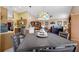 Cozy dining area featuring a unique lighting fixture and a view of the kitchen and living room at 2434 Walnut Heights Rd, Apopka, FL 32703