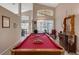 Bright game room featuring pool table and cue rack at 2434 Walnut Heights Rd, Apopka, FL 32703