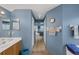Hallway with tile floor leading to the bedroom and bathroom at 2434 Walnut Heights Rd, Apopka, FL 32703