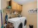 Laundry room with front loading washer and dryer at 2434 Walnut Heights Rd, Apopka, FL 32703