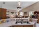 Comfortable living room with ample natural light, vaulted ceilings and an open concept design at 2434 Walnut Heights Rd, Apopka, FL 32703