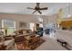 Cozy living room with ample seating and view to dining area at 2434 Walnut Heights Rd, Apopka, FL 32703