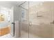 Modern bathroom featuring a glass-enclosed shower with tile surround and updated fixtures at 2475 Sw 7Th Ave, Ocala, FL 34471
